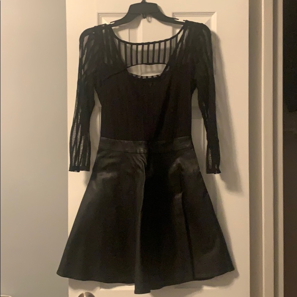 Black mesh and leather dress